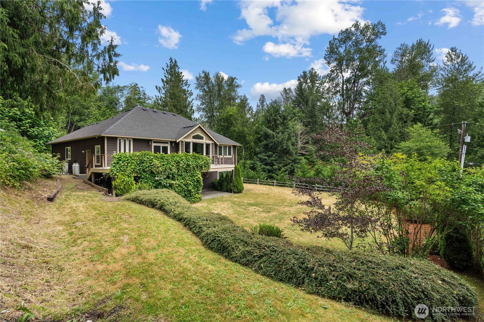 13402 Spiketon Road Buckley, WA 98321 - Photo 34 of 35 a front view of a house with a yard