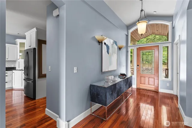 a view of living room with furniture and natural light