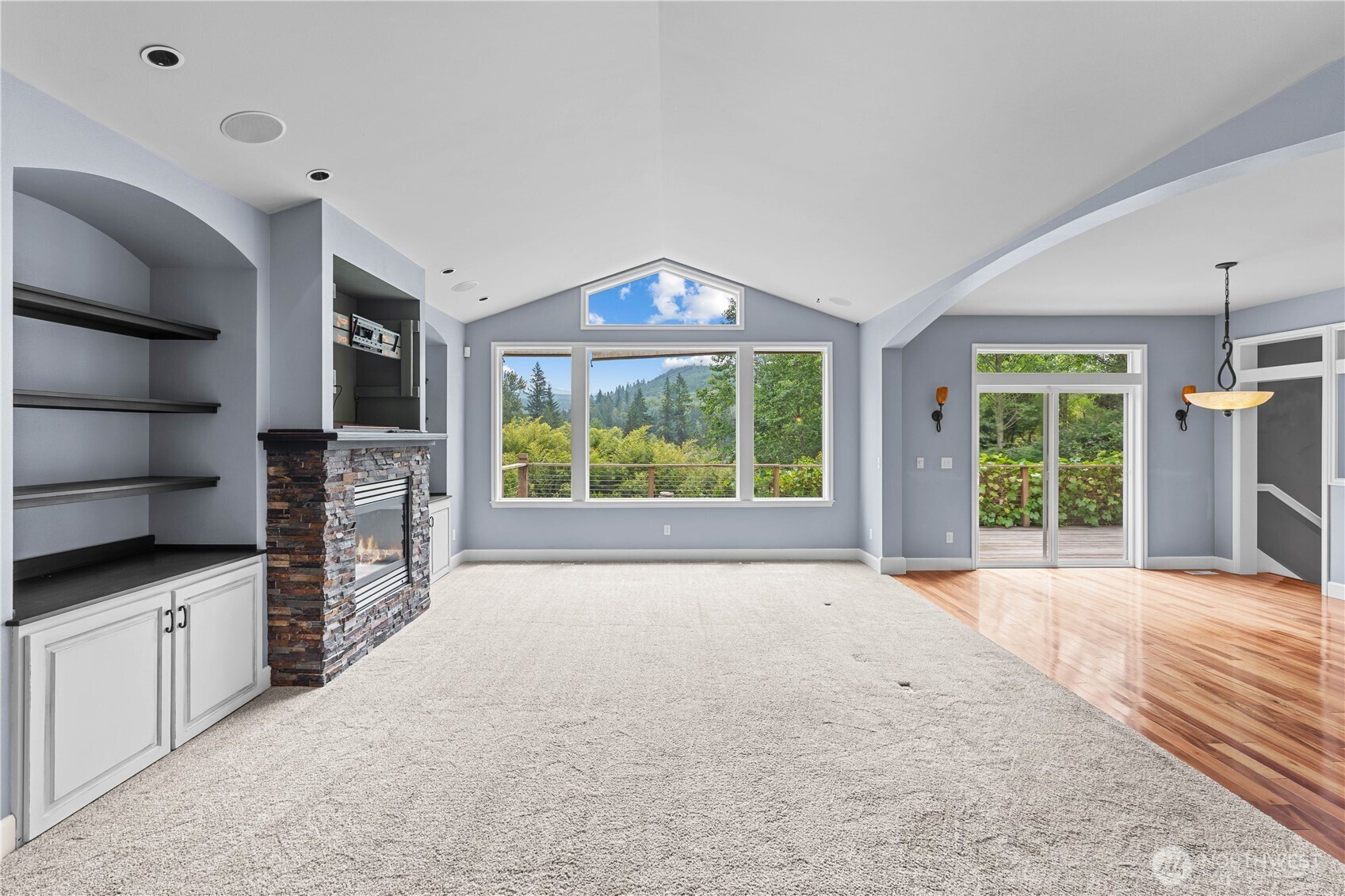 13402 Spiketon Road Buckley, WA 98321 - Photo 10 of 35 a view of empty room with wooden floor and fan