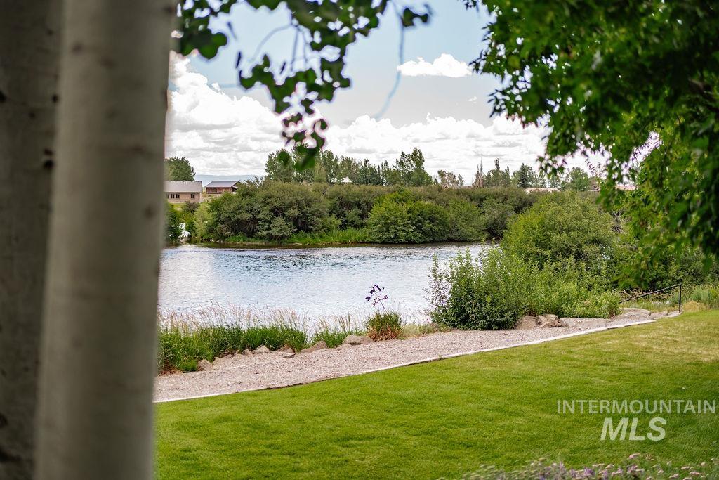 2700 North River Road St. Anthony, ID 83445 - Photo 36 of 50 Easy River Access from Walk-Out Basement Doors or simply walk down from the back deck.