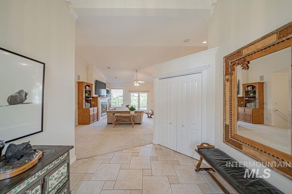2700 North River Road St. Anthony, ID 83445 - Photo 9 of 50 WELCOME to OUR RIVER RETREAT! Features light tile, crown molding, vaulted ceiling, and recessed lighting