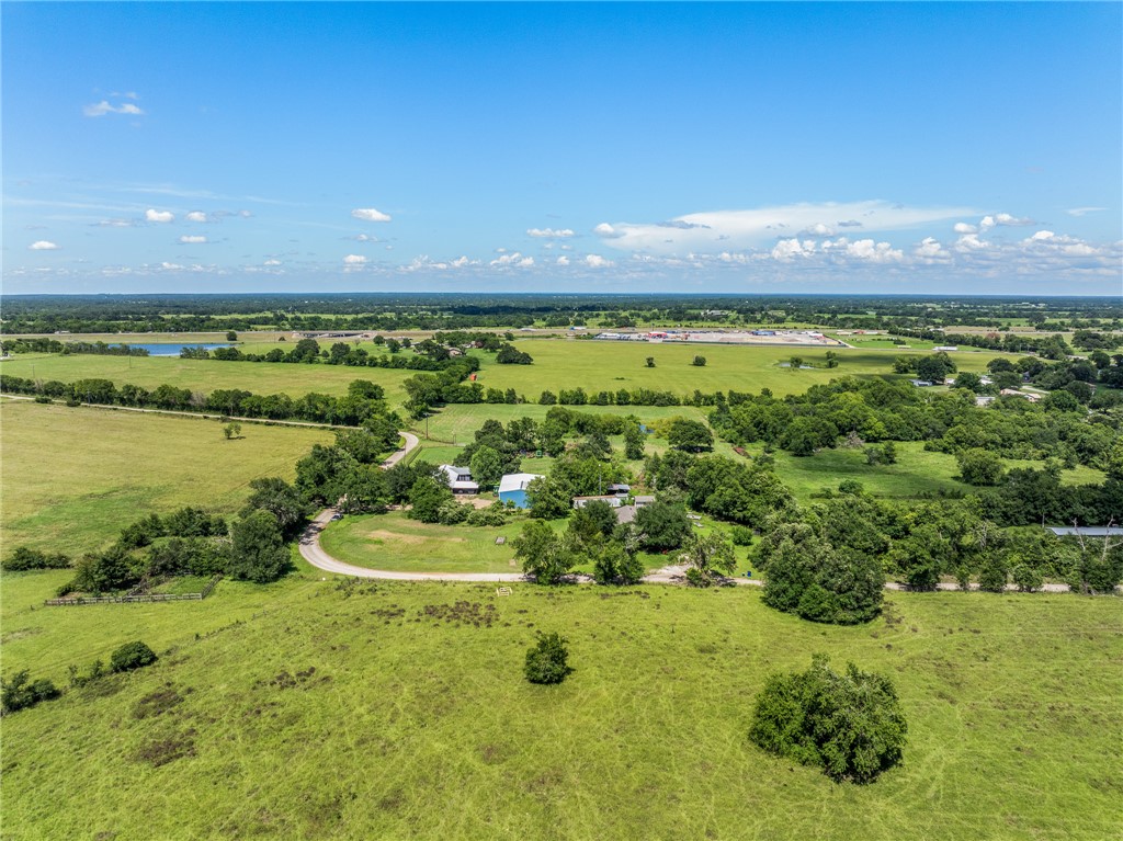 4450 Greenbriar Road Madisonville, TX 77864 - Photo 3 of 27 a view of a lake with a mountain