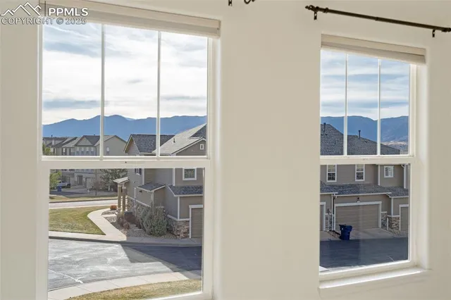 a view of a living room filled with furniture