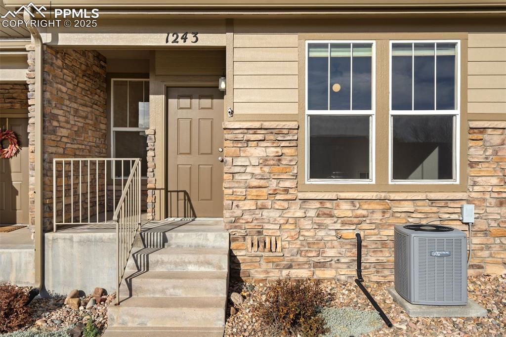 1243 Timber Run Heights Monument, CO 80132 - Photo 26 of 34 a view of entrance gate of a house