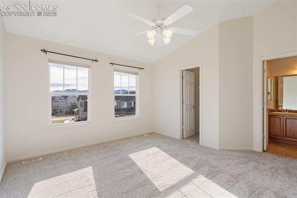 1243 Timber Run Heights Monument, CO 80132 - Photo 32 of 34 an empty room with windows and closet