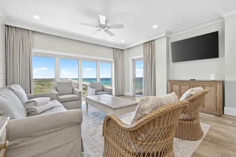 a large kitchen with a table and chairs