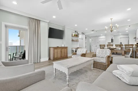 a large kitchen with kitchen island a sink stainless steel appliances and cabinets