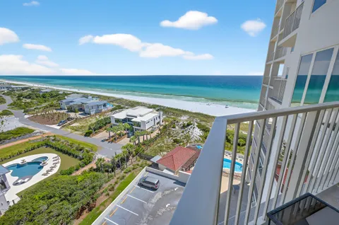 a view of a swimming pool with a balcony