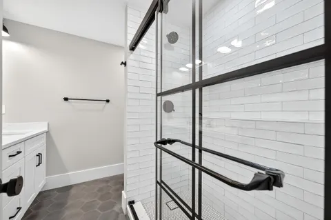 a living room with furniture flat screen tv and a fireplace