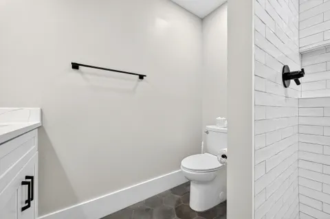 a view of a swimming pool with a glass door