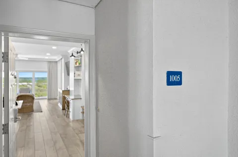 a kitchen with counter top space a sink appliances and cabinets