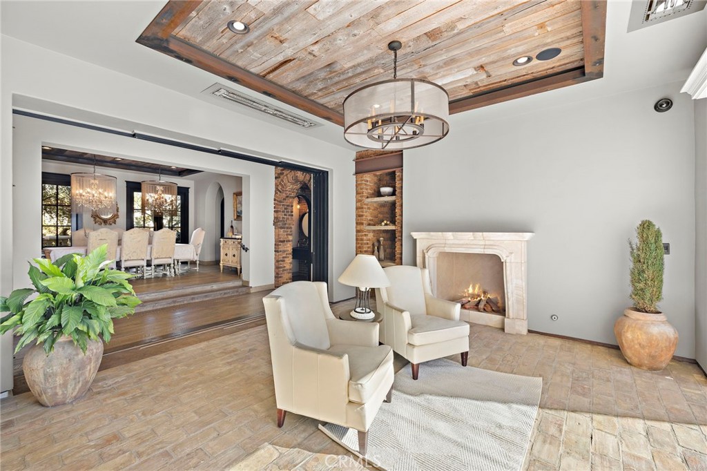 12 Thomas Road Ladera Ranch, CA 92694 - Photo 17 of 70 a living room with patio island furniture and a chandelier