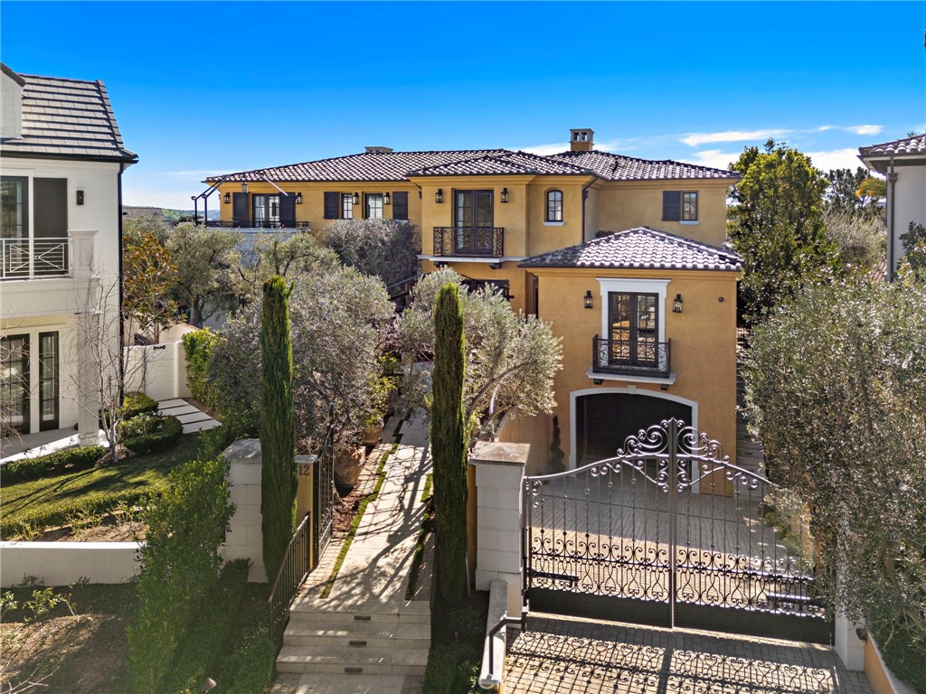 12 Thomas Road Ladera Ranch, CA 92694 - Photo 2 of 70 a front view of a house with a yard