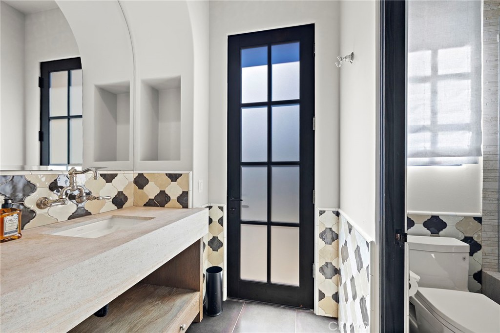 12 Thomas Road Ladera Ranch, CA 92694 - Photo 33 of 70 a bathroom with a bathtub and a sink