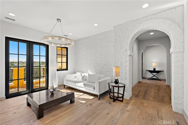 a outdoor space with lots of furniture and potted plants