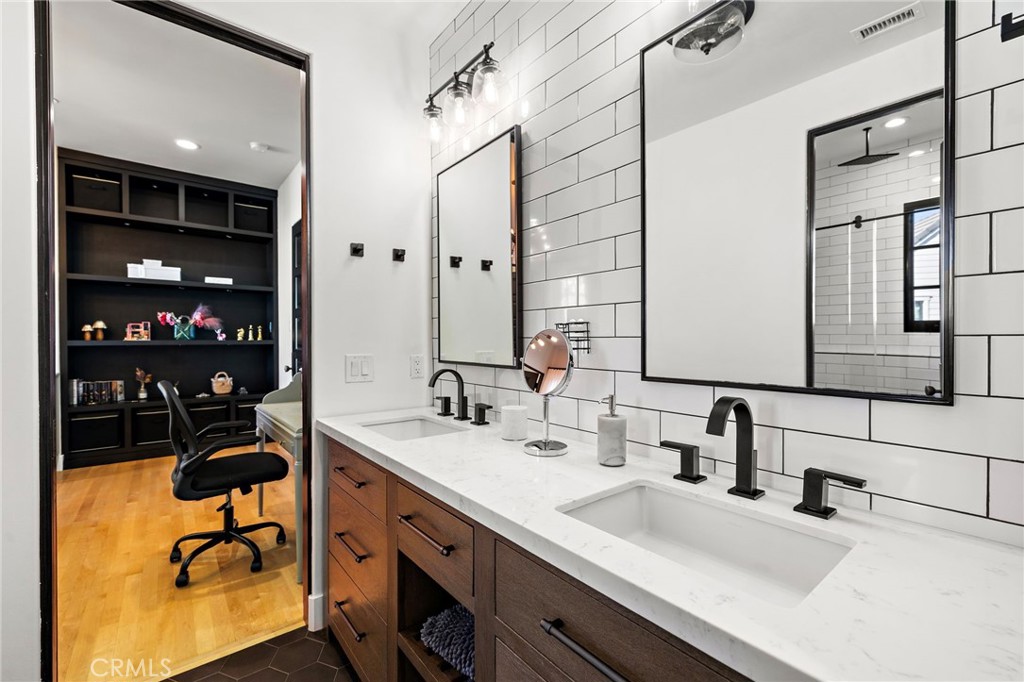12 Thomas Road Ladera Ranch, CA 92694 - Photo 46 of 70 a bathroom with a sink double vanity and a mirror