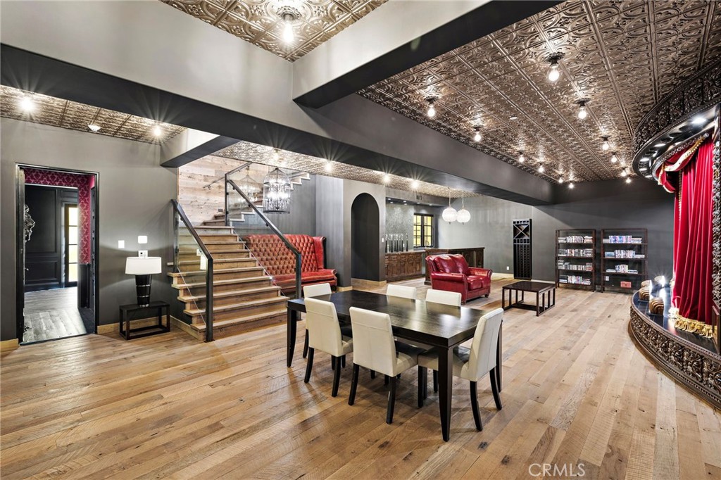 12 Thomas Road Ladera Ranch, CA 92694 - Photo 50 of 70 a dining room with furniture and wooden floor