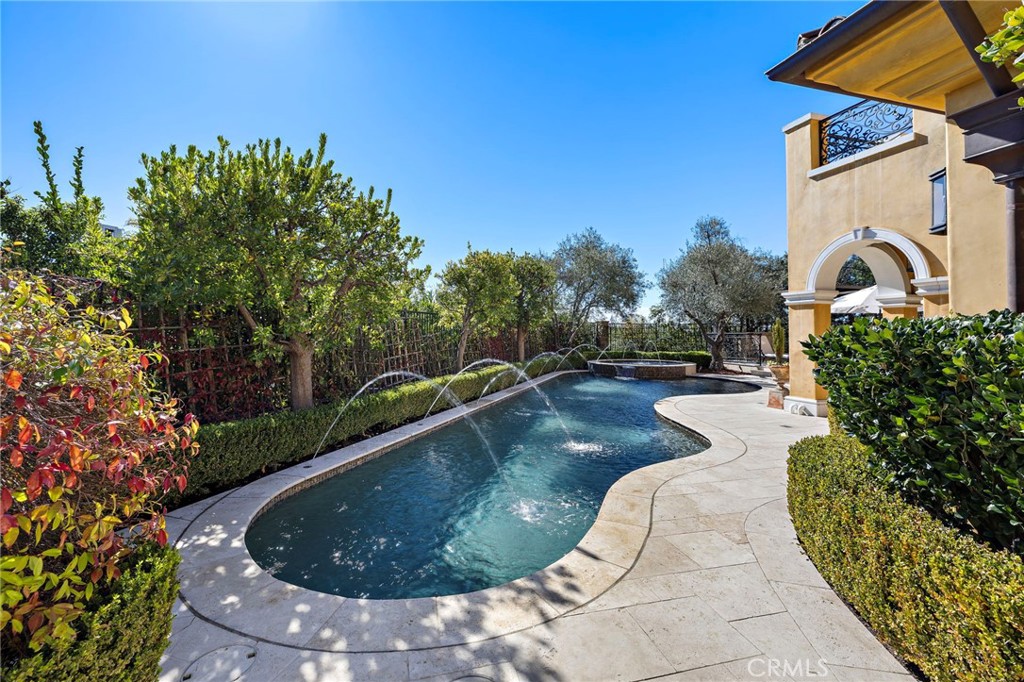 12 Thomas Road Ladera Ranch, CA 92694 - Photo 5 of 70 a view of a swimming pool with a yard