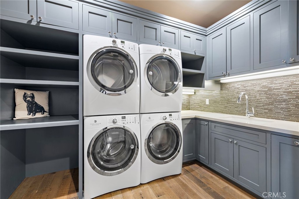 12 Thomas Road Ladera Ranch, CA 92694 - Photo 55 of 70 a utility room with sink dryer and washer