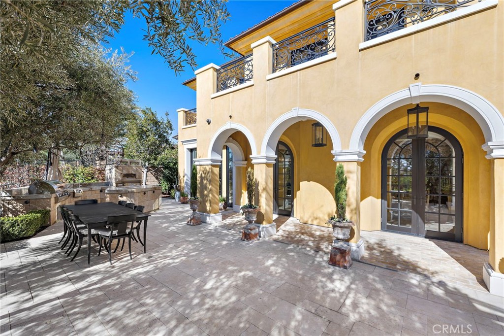 12 Thomas Road Ladera Ranch, CA 92694 - Photo 62 of 70 a view of a dinning table and chairs in patio