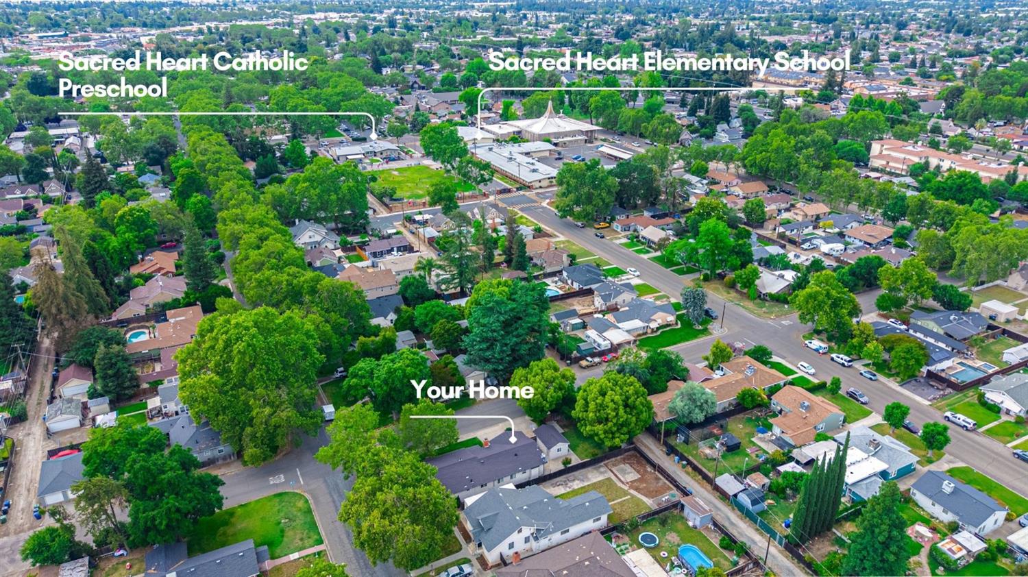 550 Bell Street Turlock, CA 95380 - Photo 34 of 36 an aerial view of a houses with a yard and lake view