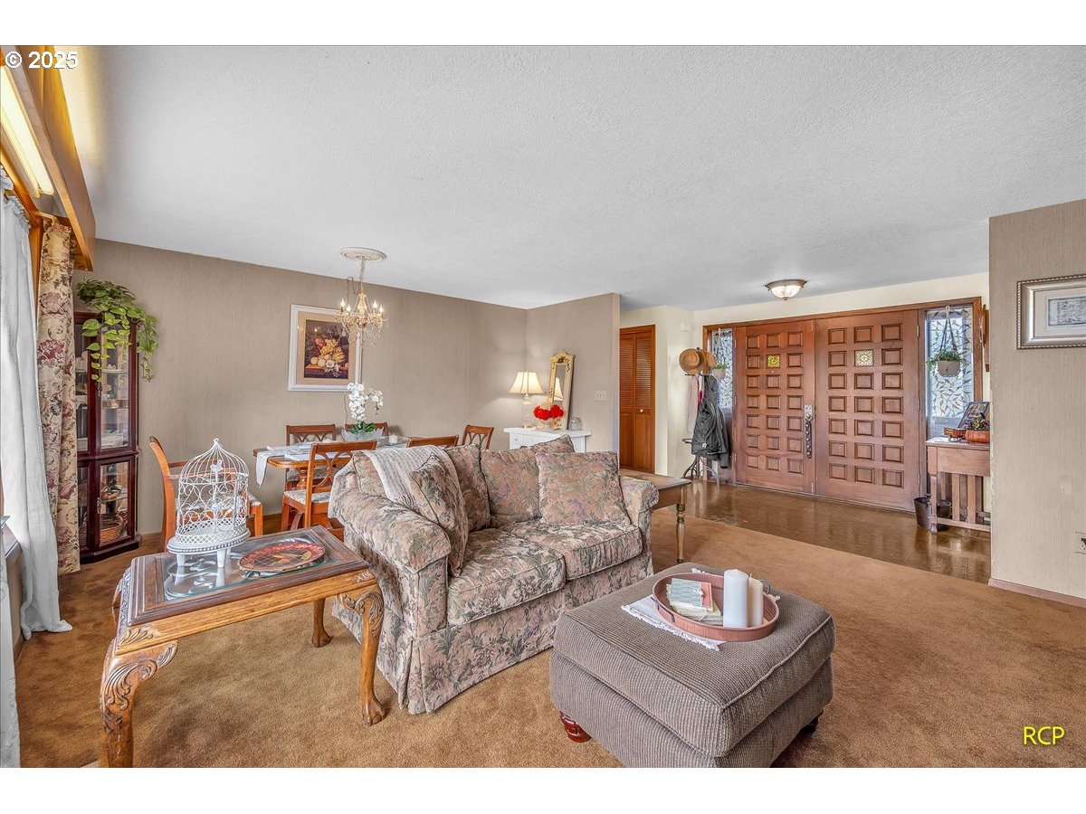 24312 Cardwell Hill Drive Philomath, OR 97370 - Photo 13 of 48 a living room with furniture and a window