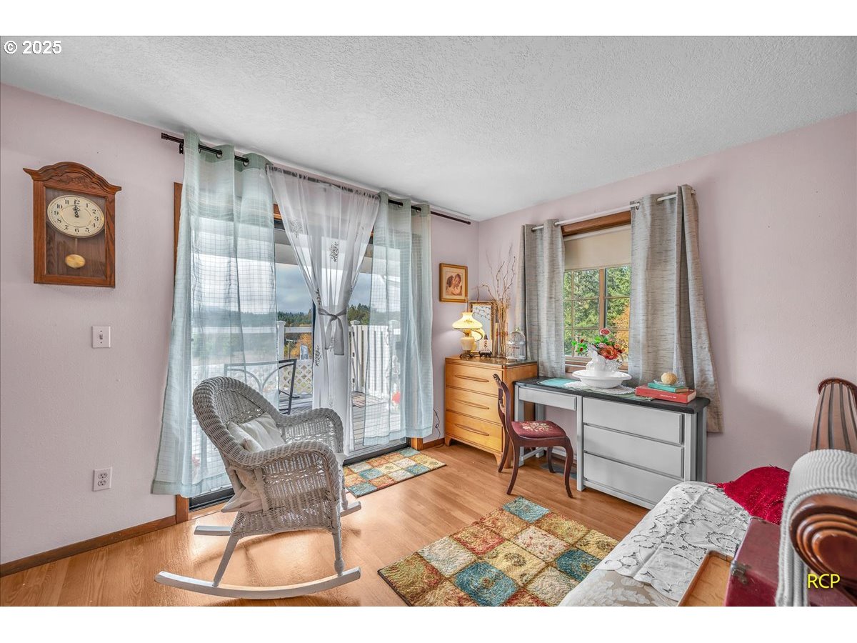 24312 Cardwell Hill Drive Philomath, OR 97370 - Photo 33 of 48 a living room with furniture and a window