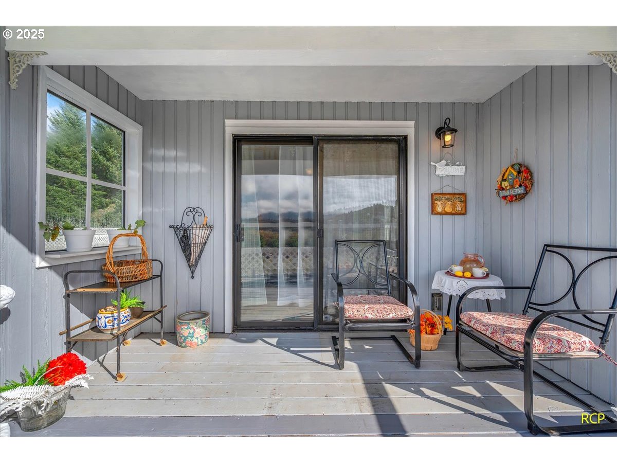 24312 Cardwell Hill Drive Philomath, OR 97370 - Photo 35 of 48 a living room filled with furniture and a window