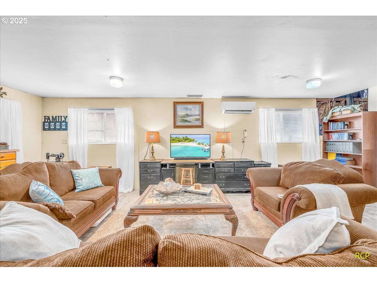 24312 Cardwell Hill Drive Philomath, OR 97370 - Photo 39 of 48 a living room with furniture and a couch