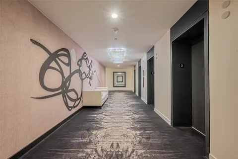 a view of a hallway with window