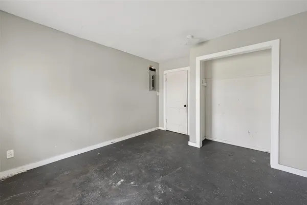 an empty room with windows