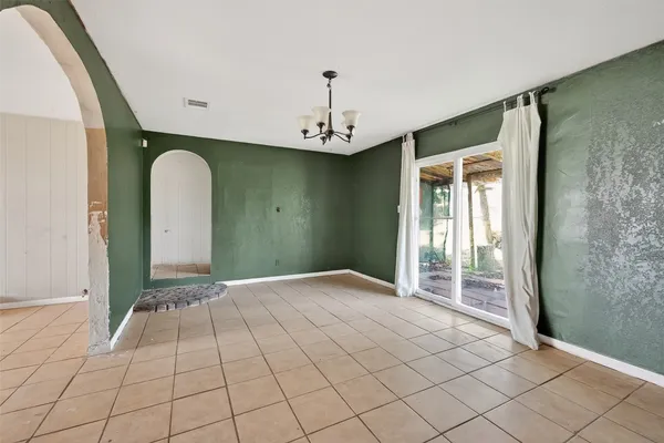 a view of an empty room with window