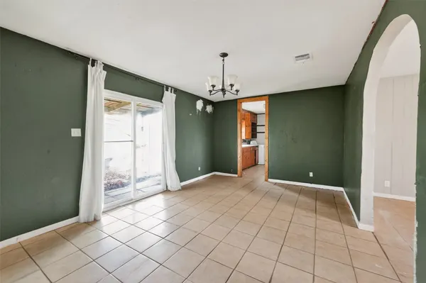 a view of a room with an entryway