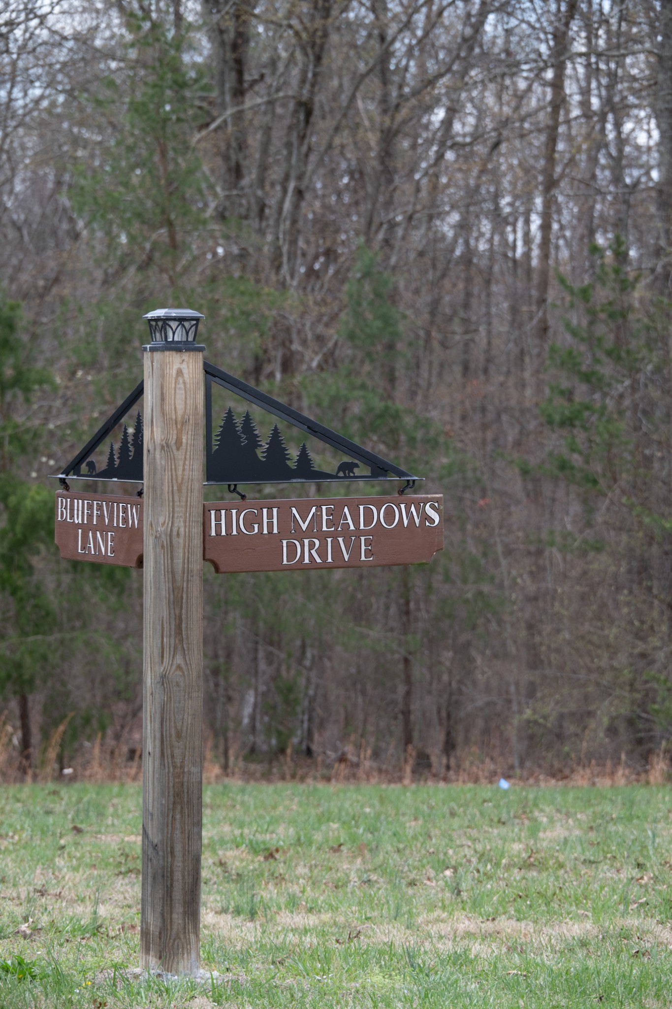 0 High Meadow Spencer, TN 38585 - Photo 4 of 17 a sign that is on a brick wall