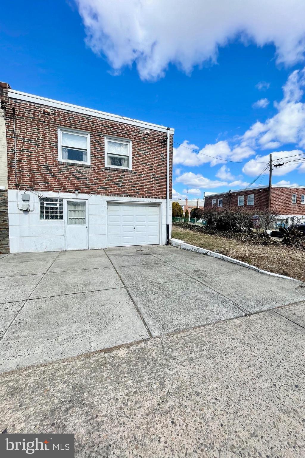8941 Blue Grass Road Philadelphia, PA 19152 - Photo 24 of 33 Exterior Rear with Garage & 2 Car Driveway