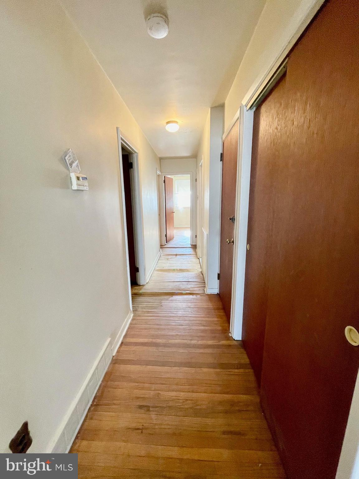 8941 Blue Grass Road Philadelphia, PA 19152 - Photo 10 of 33 Hallway Leading to Bedrooms