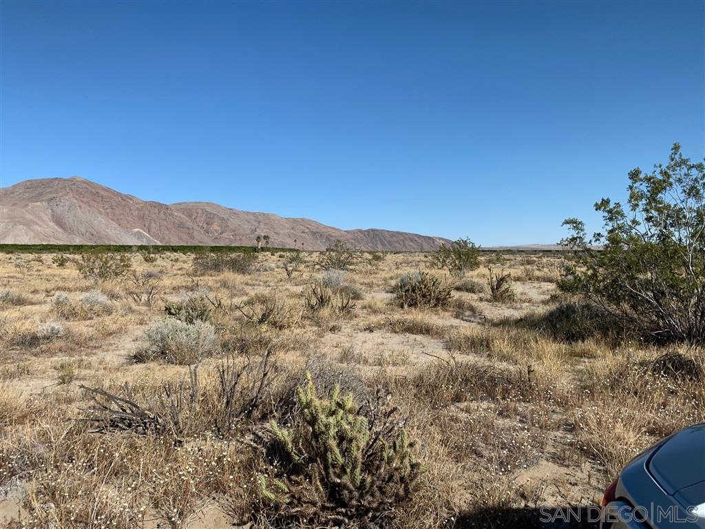 59 Indian Head Ranch Road Borrego Springs, CA 92004 - Photo 6 of 7 a view of a large mountain with mountains in the background