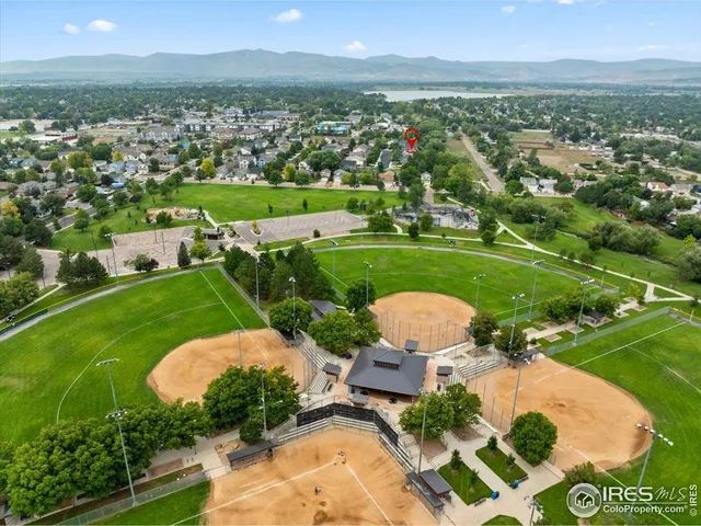 an aerial view of a house with garden space and outdoor space
