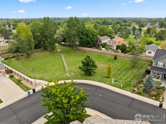 a view of a garden from a balcony