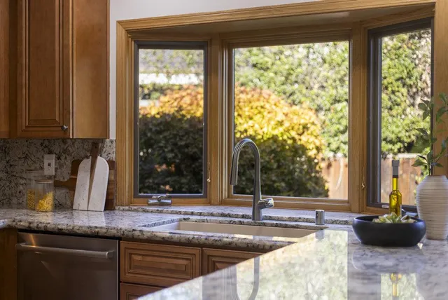 a bedroom with a bed and a painting