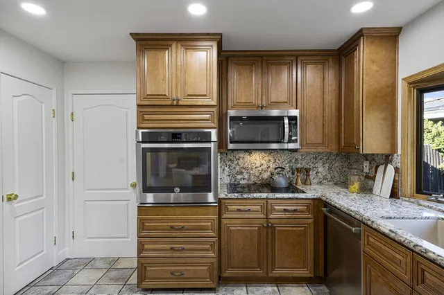 a spacious bathroom with a double vanity sink and a mirror