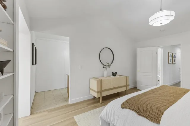 a view of a backyard with a patio and outdoor seating