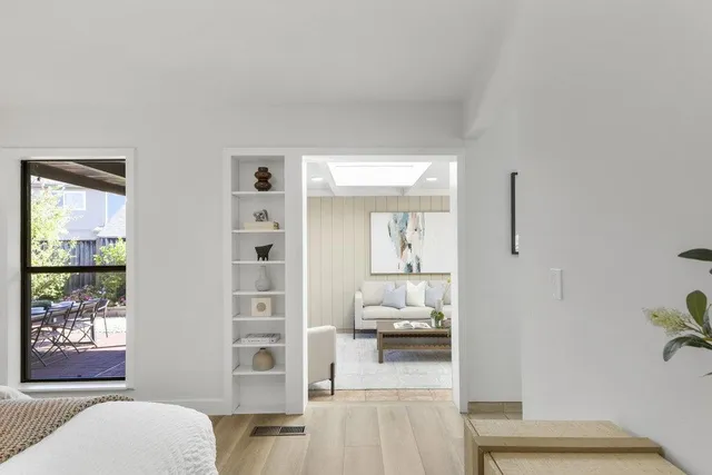 a view of outdoor space with seating area and trees around