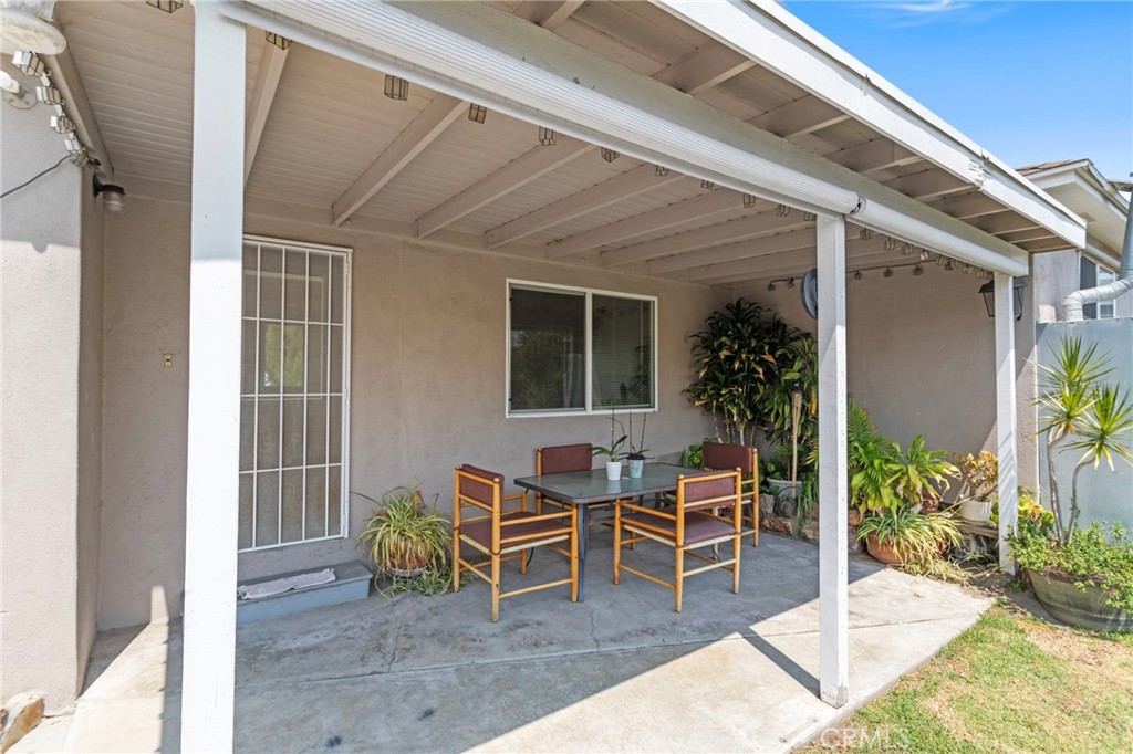 7508 Brookmill Road Downey, CA 90241 - Photo 25 of 29 a view of a house with backyard and sitting area