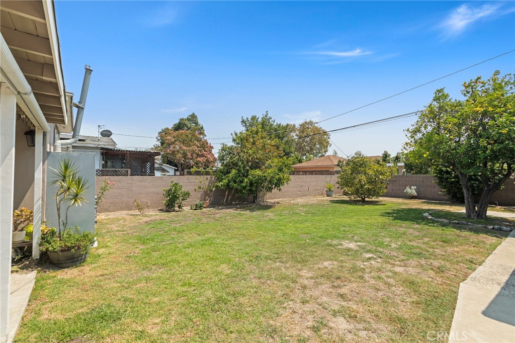 7508 Brookmill Road Downey, CA 90241 - Photo 28 of 29 a backyard of a house with lots of green space