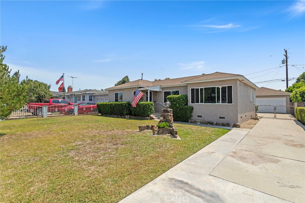 7508 Brookmill Road Downey, CA 90241 - Photo 4 of 29 a front view of house with outdoor space and seating area