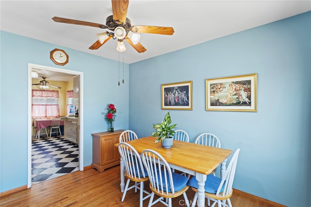 7508 Brookmill Road Downey, CA 90241 - Photo 9 of 29 a view of a dining room with furniture and wooden floor