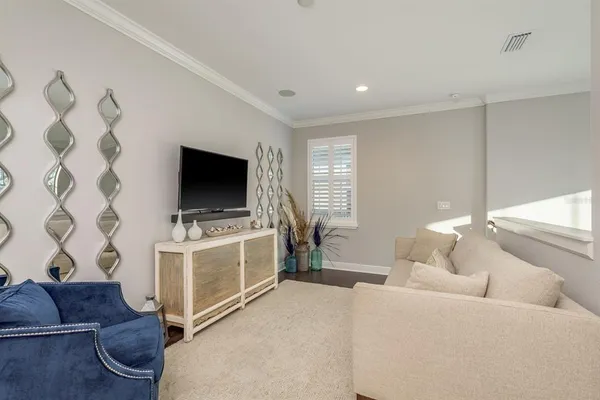 a living room with a couch and a couch