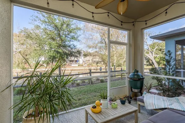 a view of balcony with couch and outdoor seating