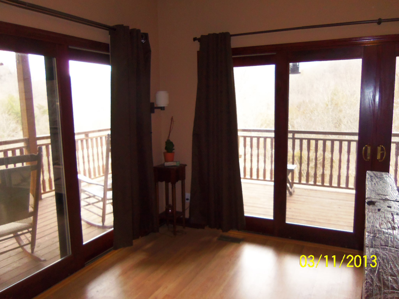 3210 Seneca Hollow Road Elliston, VA 24087 - Photo 16 of 40 a view of an empty room with wooden floor and a window